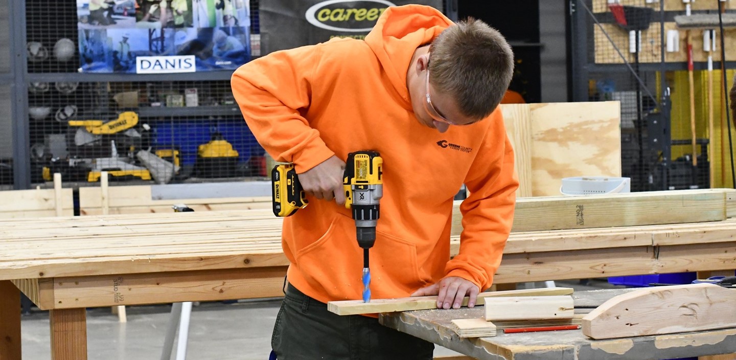 Construction Tech Student Drilling 